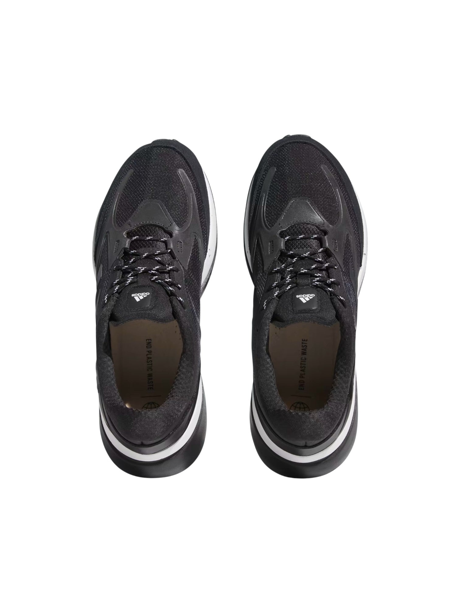 Black sneakers with white soles on a white background. Adidas, Monza Outlet, Monza Fashion, Shein Outlet