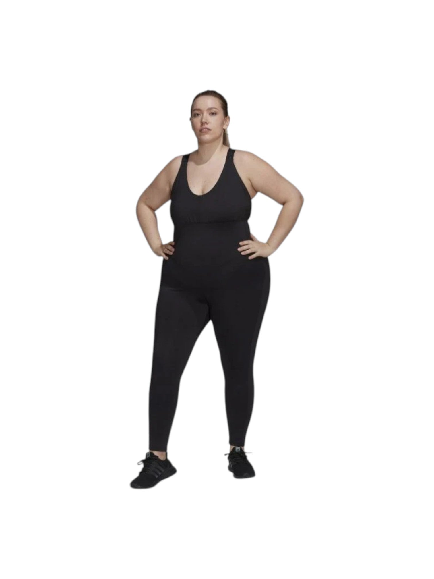 Person wearing a black outfit on a white background. Adidas, Monza Outlet, Monza Fashion, Shein Outlet