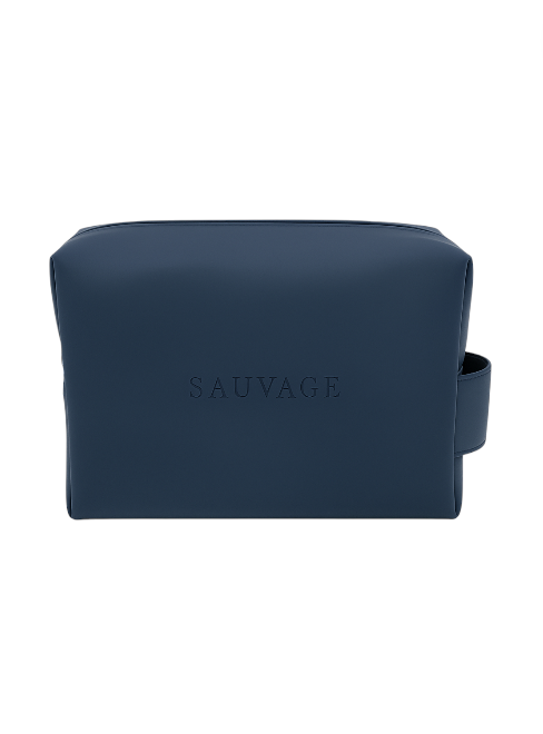 Navy blue toiletry bag with 'SAUVAGE' branding on a white background