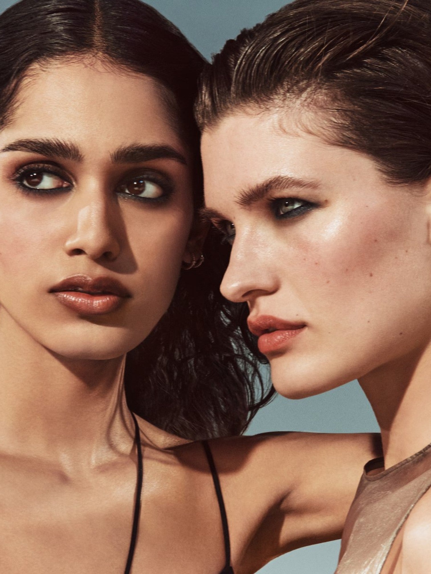 Close-up of two women with a neutral background. Bobbi Brown, Monza Outlet, Monza Fashion, Shein Outlet