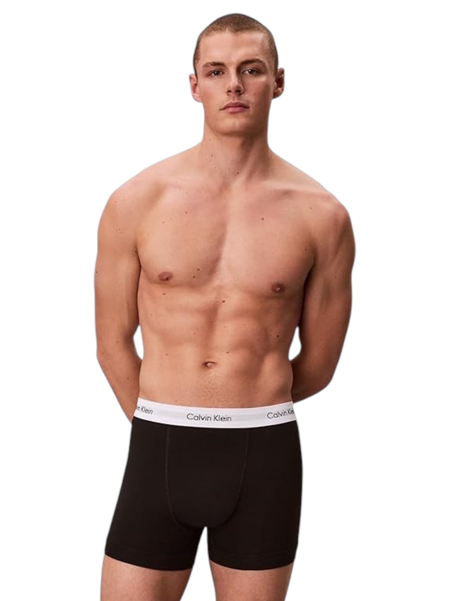 Man wearing black Calvin Klein boxer briefs on a white background. Calvin Klein, Monza Outlet, Monza Fashion, Shein Outlet