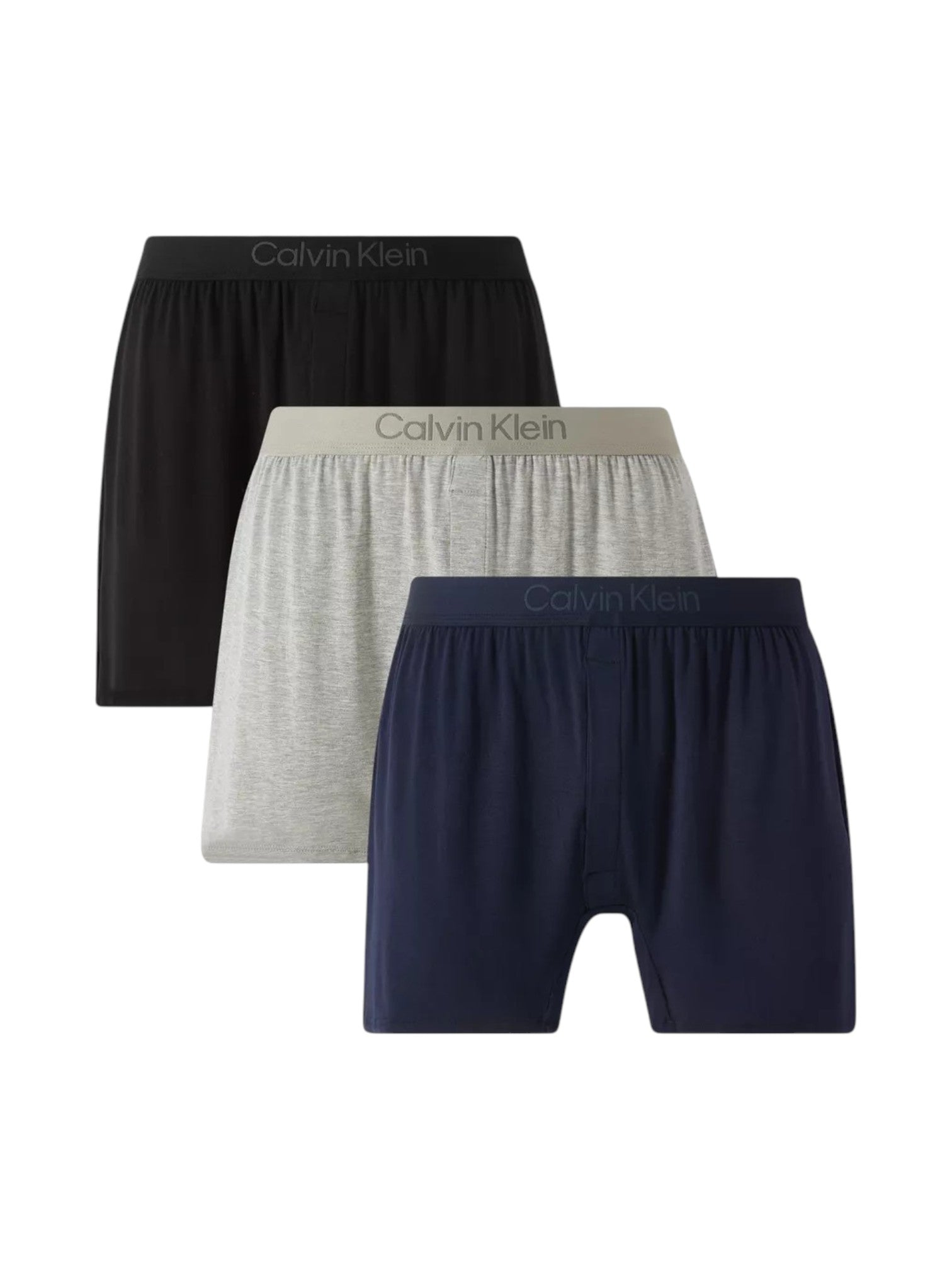 Three pairs of Calvin Klein men's boxer briefs stacked in a fan arrangement on a white background, shown in black, light gray, and navy blue. Calvin Klein, Monza Outlet, Monza Fashion, Shein Outlet