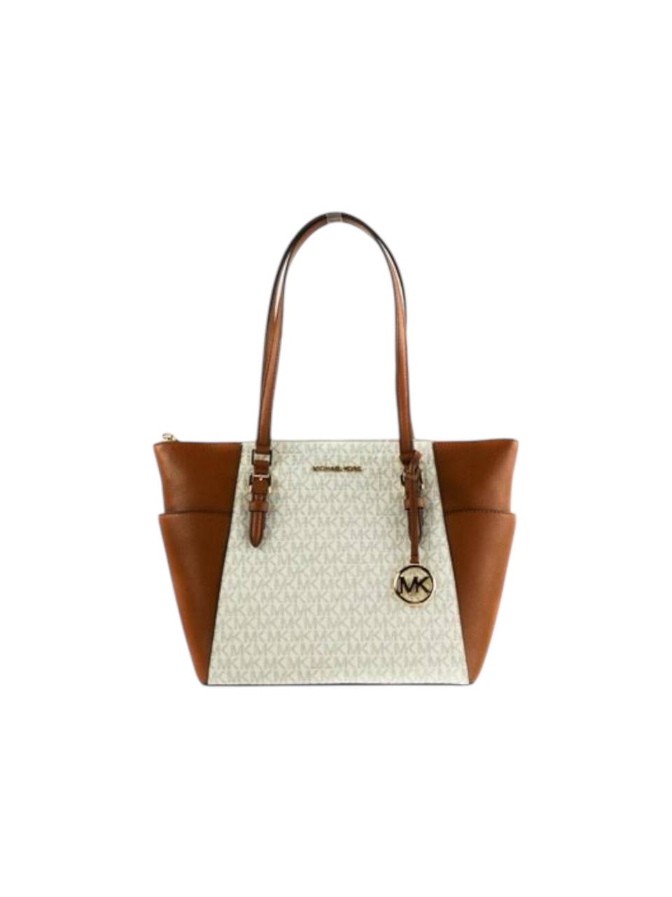 Two-tone handbag with brown and beige sections on a white background Michael Kors Monza Outlet
