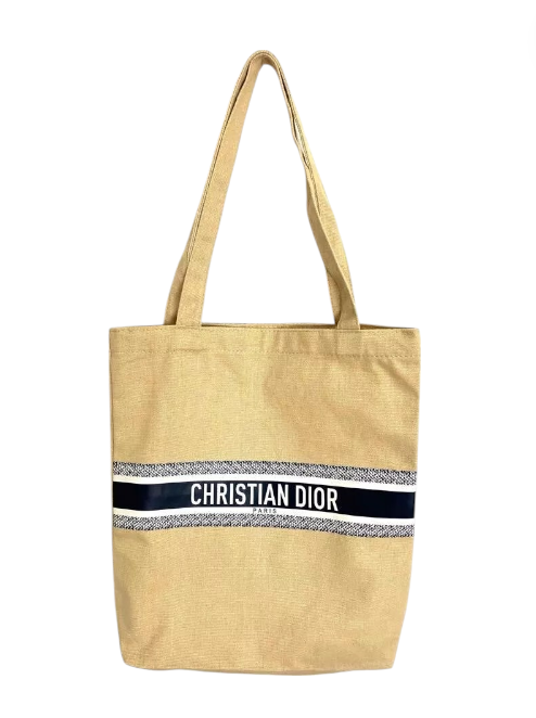 Beige tote bag with a Christian Dior stripe on a white background. Monza Outlet