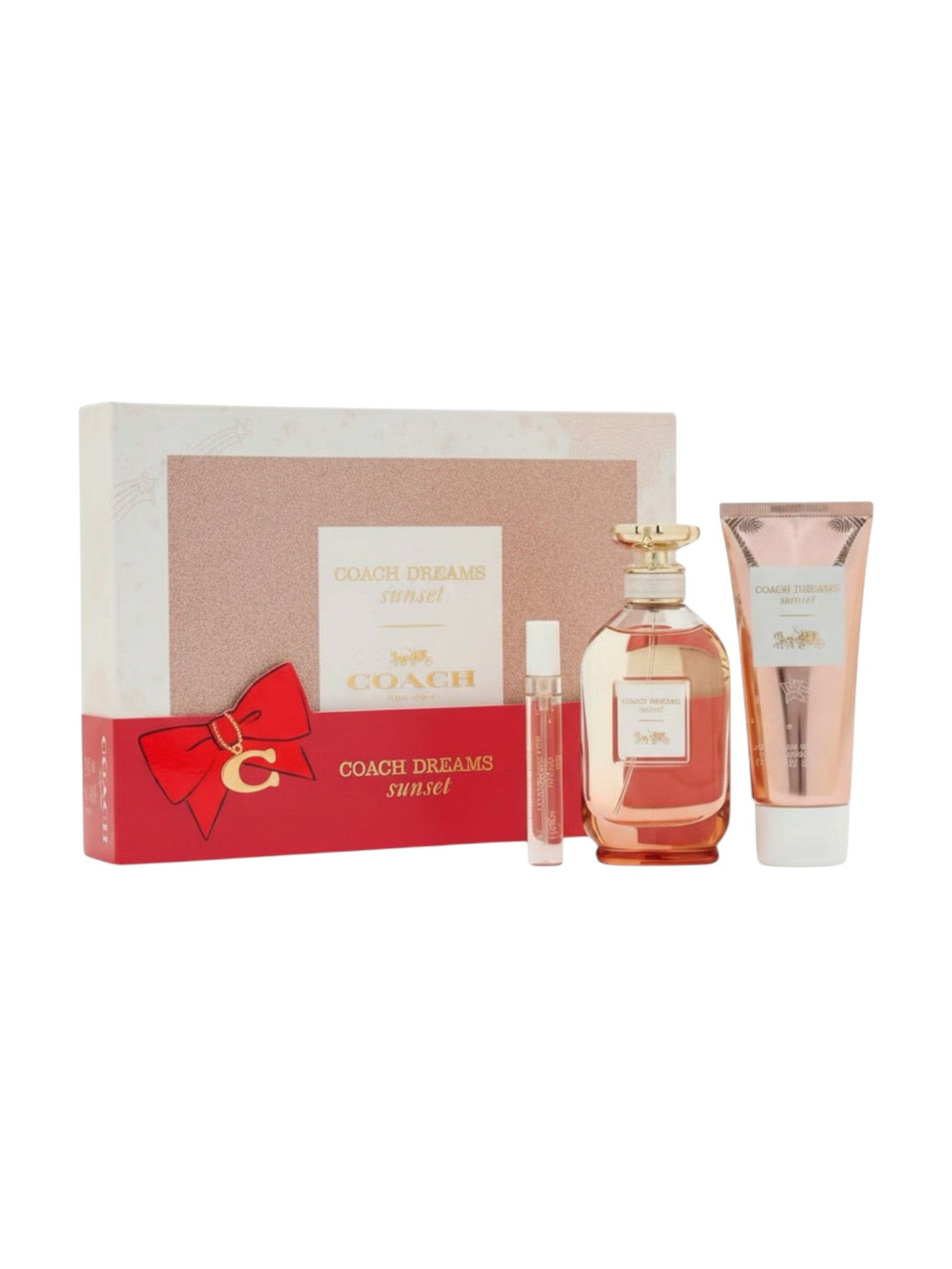 Coach Dreams Sunset perfume set with a red bow on a white background. Coach, Monza Outlet, Monza Fashion, Shein Outlet