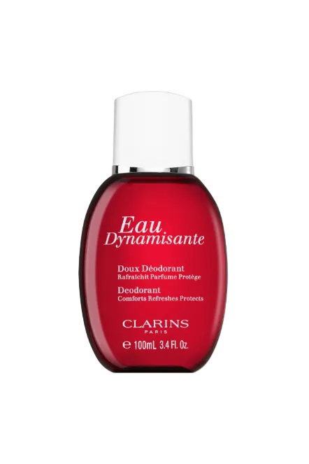 Red deodorant bottle with white cap labeled 'Eau Dynamisante' by Clarins on a white background monza outlet, Shein outlet, monza fashion