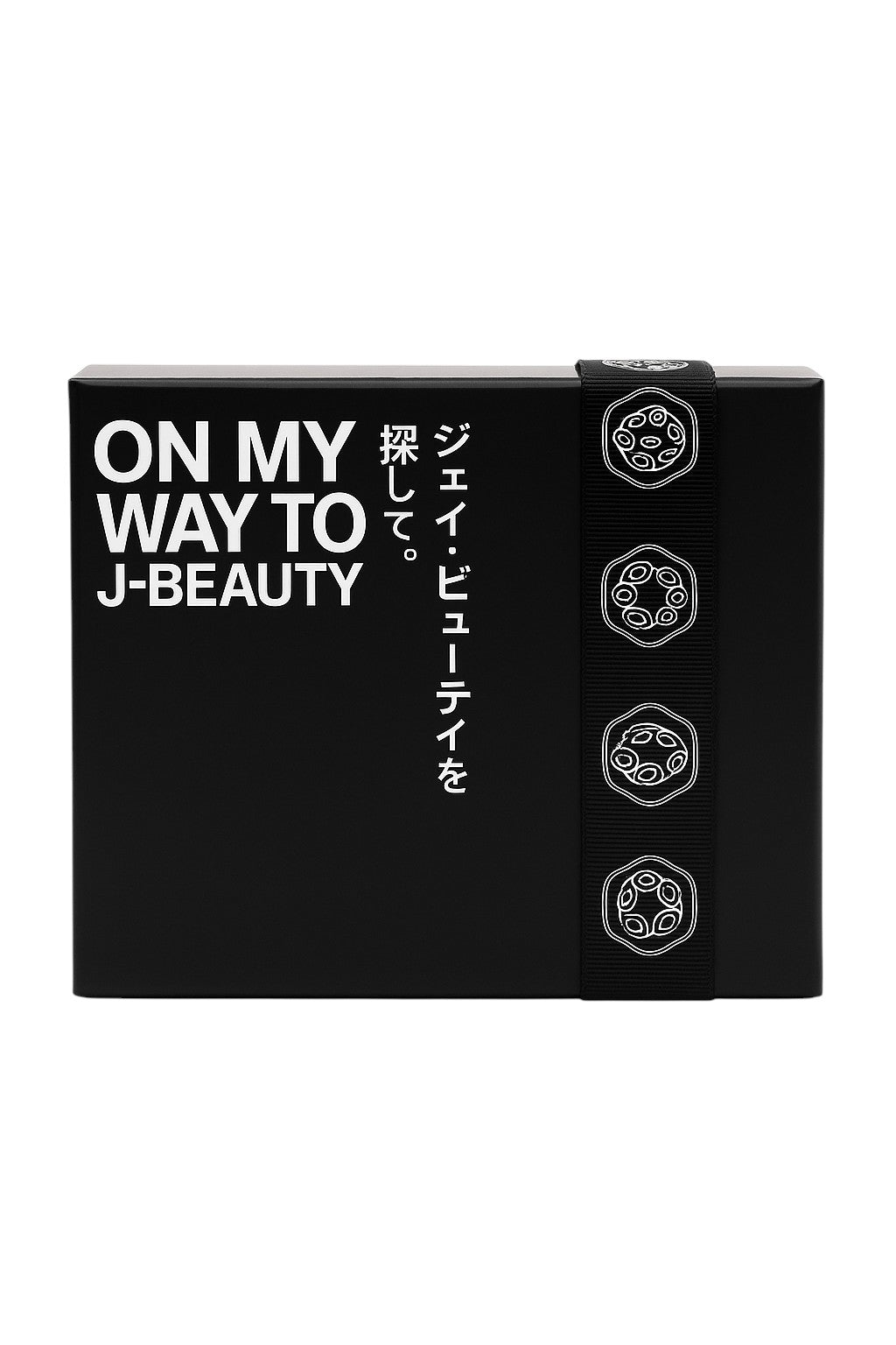 Black cosmetic box with 'ON MY WAY TO J-BEAUTY' text on a white background Monza outlet, monza fashion, shein outlet, shien outlet