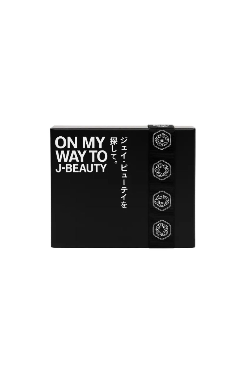 Black cosmetic box with 'ON MY WAY TO J-BEAUTY' text on a white background Monza outlet, monza fashion, shein outlet, shien outlet