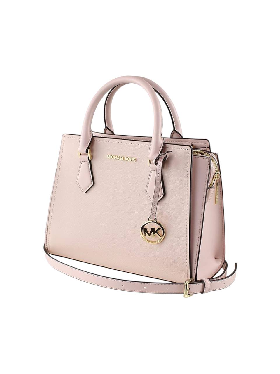 Pink handbag with gold accents on a white background Michael Kors Monza Outlet, Monza Fashion, Shein Outlet