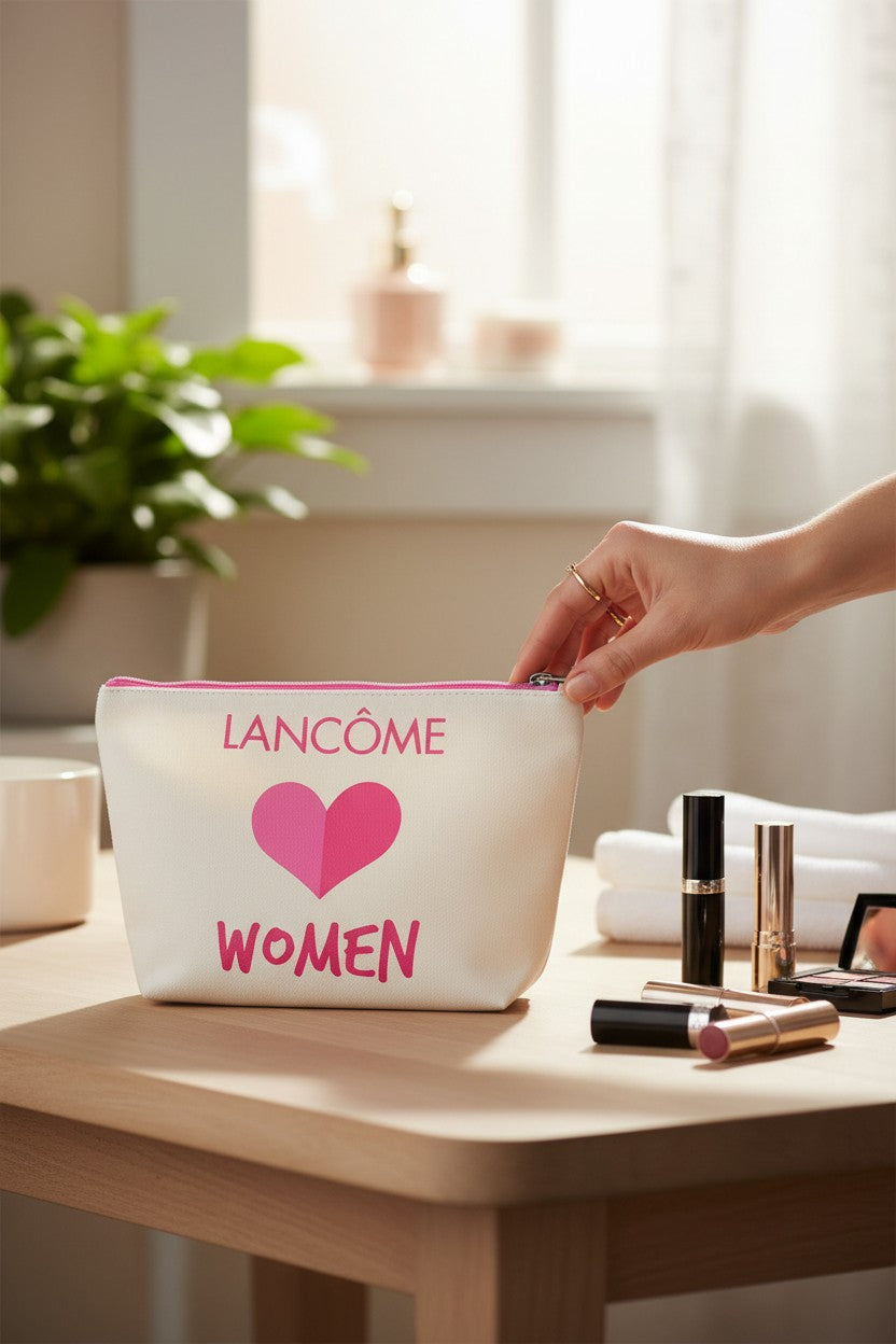 Lancème makeup bag with heart design on a table with makeup items. Lancome, Monza Outlet, Monza Fashion, Shein Outlet