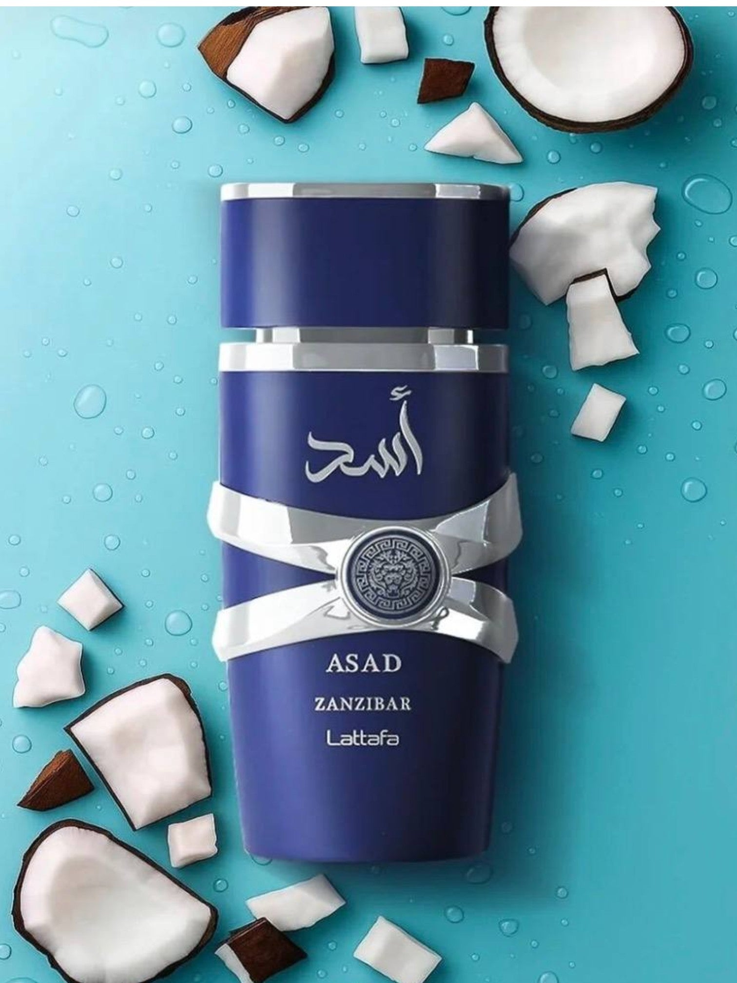 Blue bottle with silver accents on a blue background with coconut pieces. Lattafa, Monza Outlet, Monza Fashion, Shein Outlet