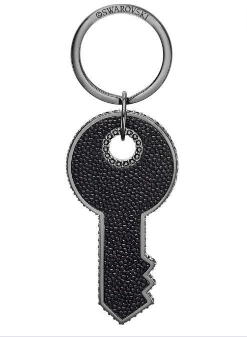 Key-shaped keychain with Swarovski logo on a white background Swarovski Monza Outlet