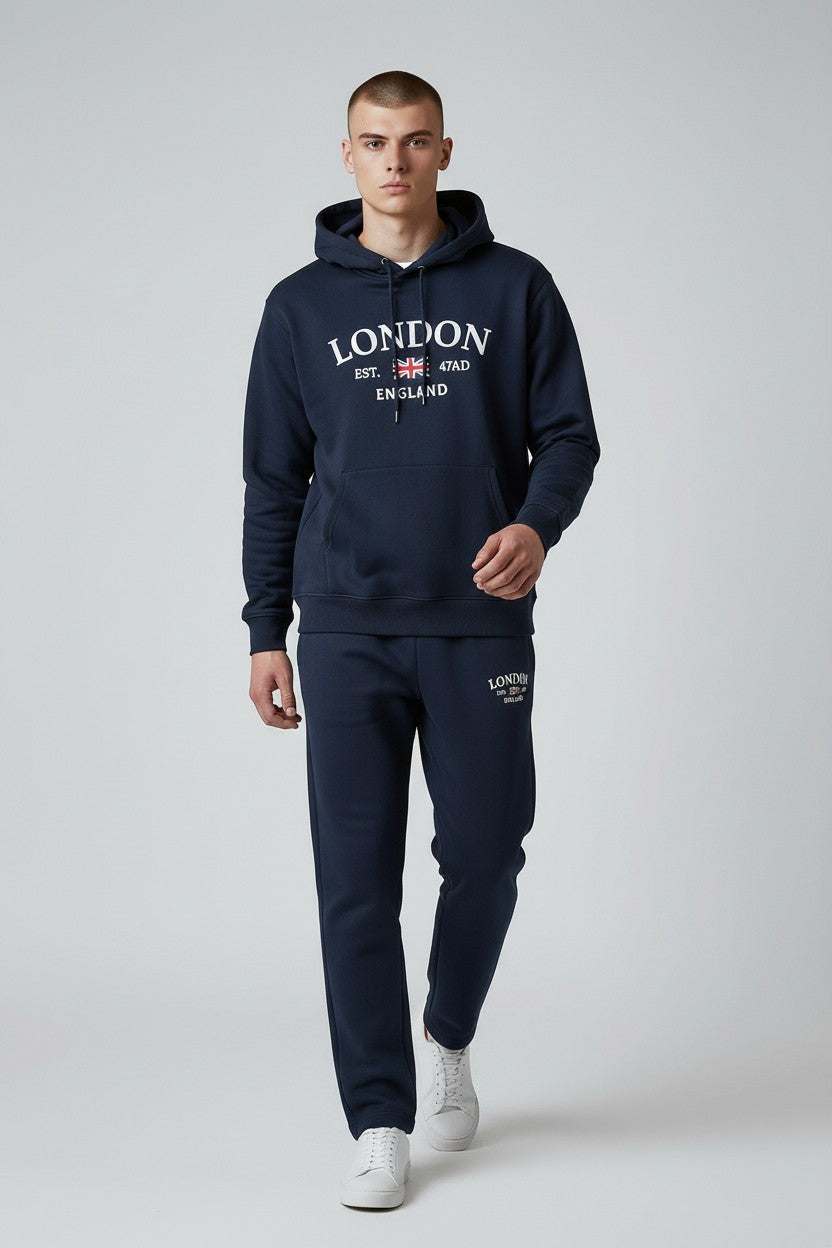 Man wearing a navy hoodie and jogger set with London text on a white background. Antler, Monza Outlet, Monza Fashion, Shein Outlet