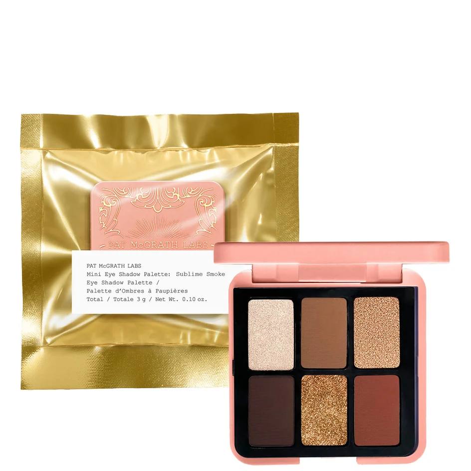 A mini eye shadow palette by Pat McGrath Labs with six warm-toned shades displayed alongside its packaging which has a golden appearance with a product label. Monza Outlet