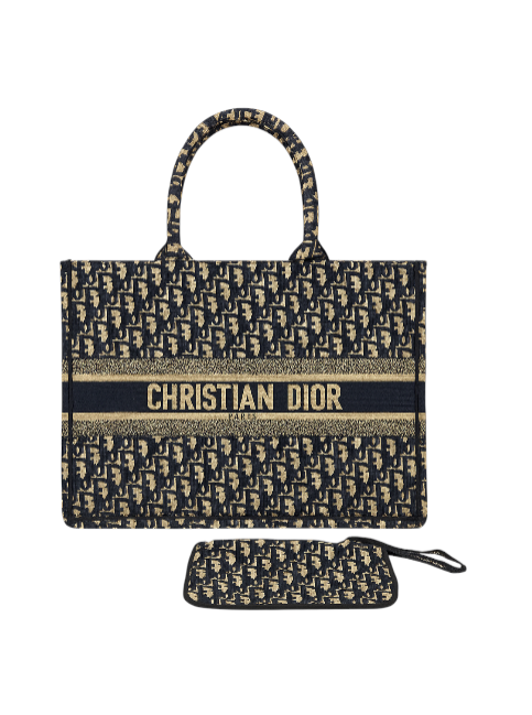 Black and gold Christian Dior handbag with matching pouch on a white background. Monza Outlet