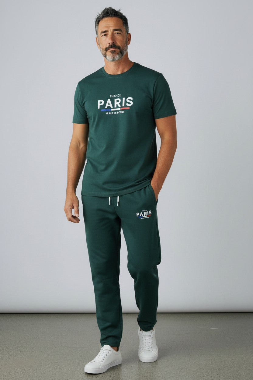 Man wearing a green Paris t-shirt and pants against a plain background. Antler, Monza Outlet, Monza Fashion, Shein Outlet