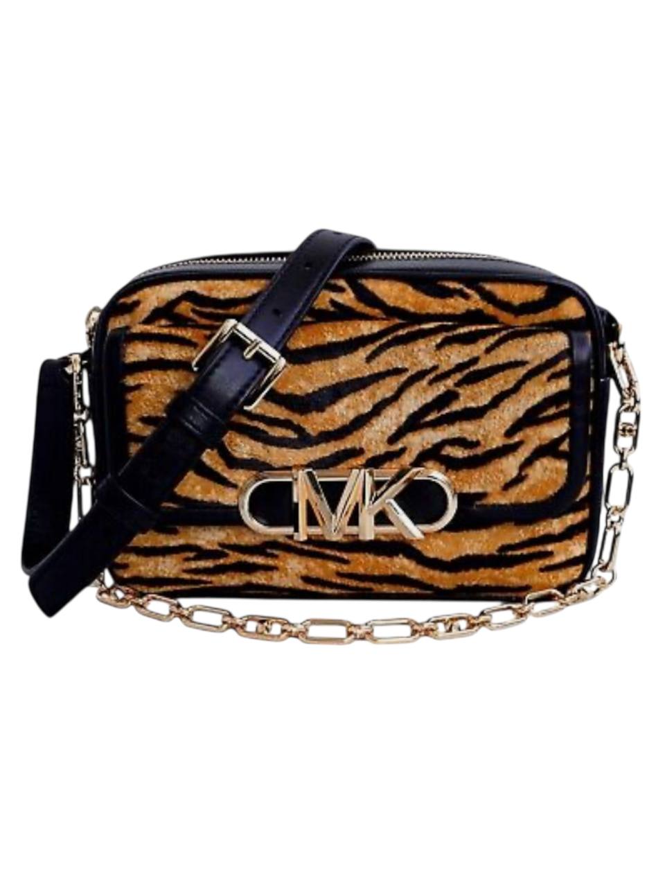 Designer handbag with tiger stripe pattern and gold chain detail on a white background, Michael Kors, Monza Outlet, Monza Fashion, Shein Outlet