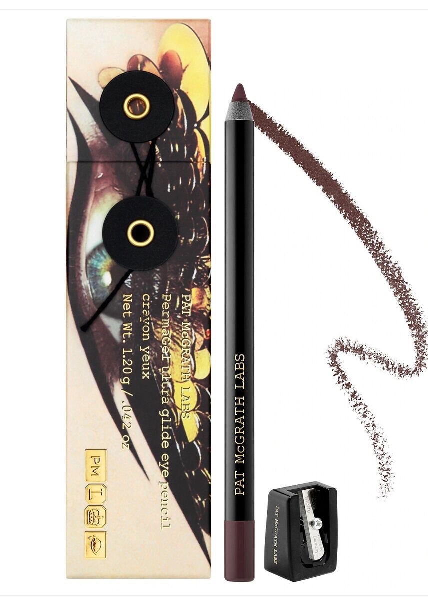 Pat McGrath Labs PermaGel Ultra Glide Eye Pencil shown with its packaging and a swatch of the brown colored pencil lead. Monza Outlet