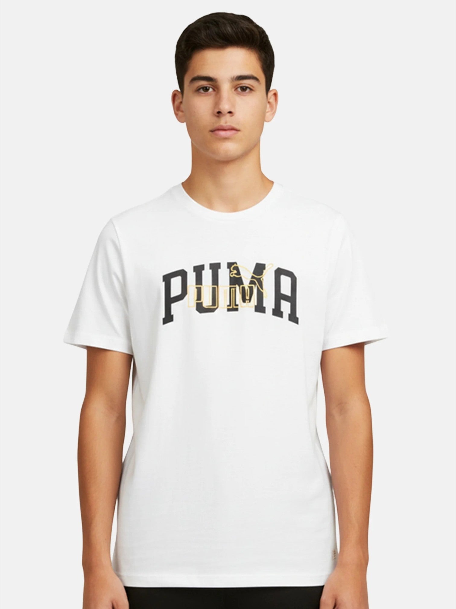 Person wearing a white Puma t-shirt on a white background. Puma, Monza Outlet, Monza Fashion, Shein Outlet
