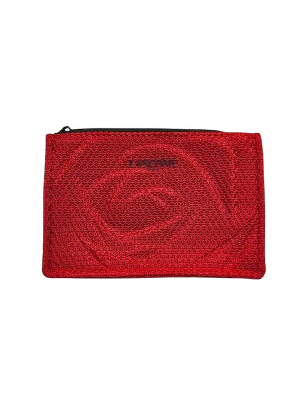 Red pouch with a textured pattern on a white background Monza fashion outlet, monza outlet, shein outlet, shien outlet cosmetics, makeup, perfume