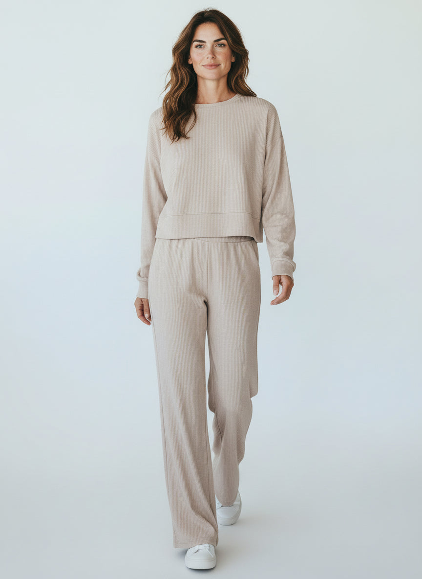 Woman wearing a beige outfit on a white background. Roncato, Monza Outlet, Monza Fashion, Shein Outlet
