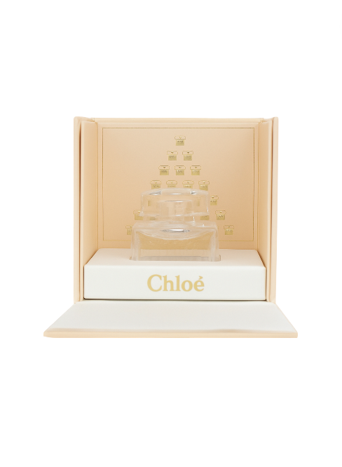Chloe perfume bottle in a wooden box on a white background Signature Monza Outlet
