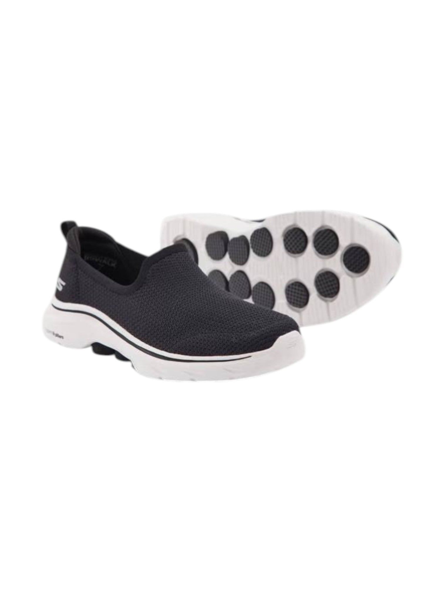 Black slip-on shoe with white sole on a white background. Skechers, Monza Outlet, Monza Fashion, Shein Outlet
