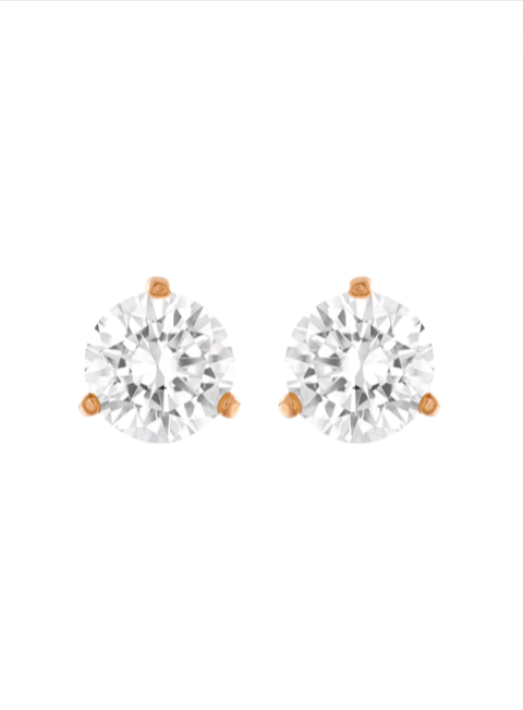 Pair of diamond stud earrings on a white background. Swarovski Monza Outlet