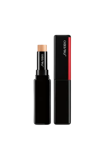Shiseido makeup stick with black casing and red accent on a white background Monza Outlet