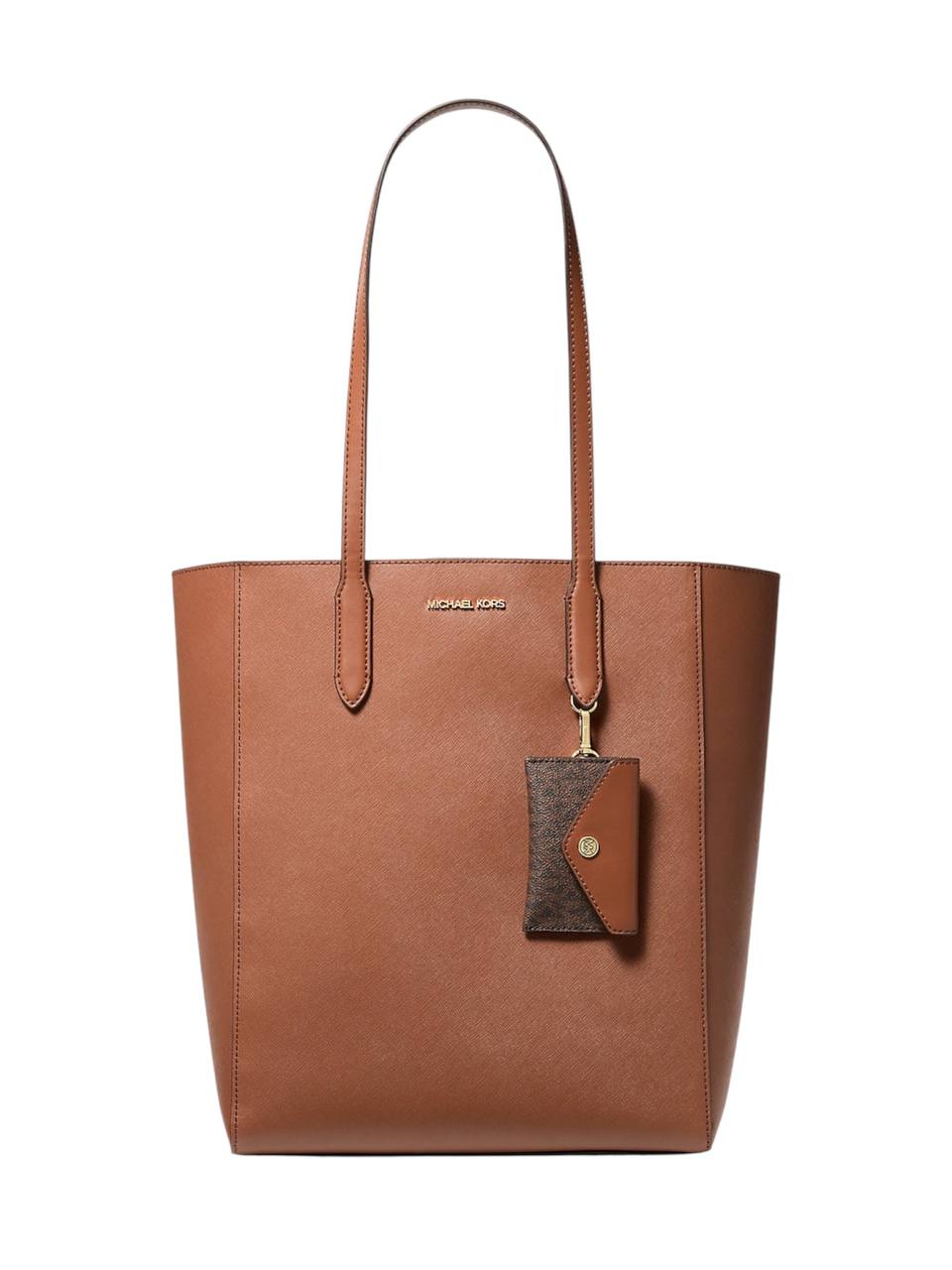 Brown tote bag with a tag on a white background Michael Kors Monza Outlet