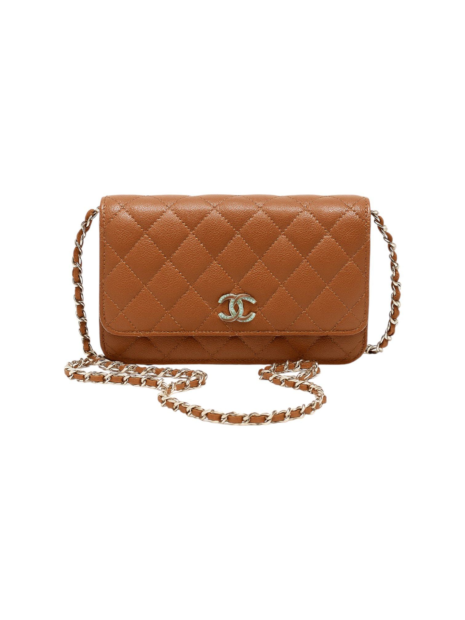 Brown quilted handbag with gold chain strap on a white background. Chanel Monza Outlet