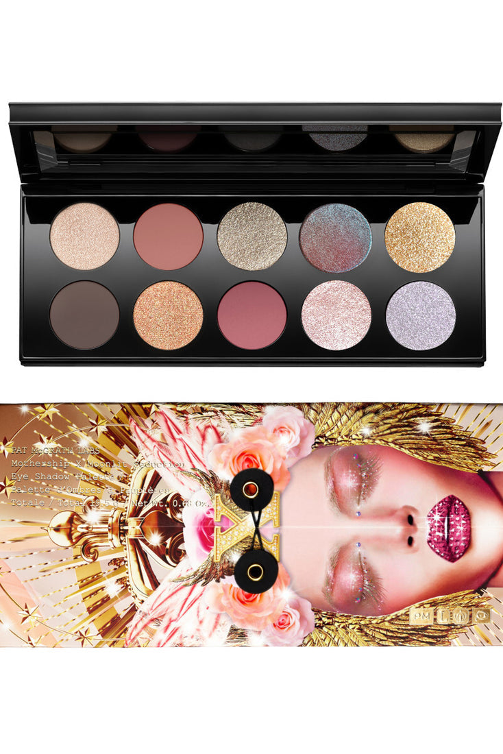 Makeup palette with various colors and a decorative face design. Monza Outlet