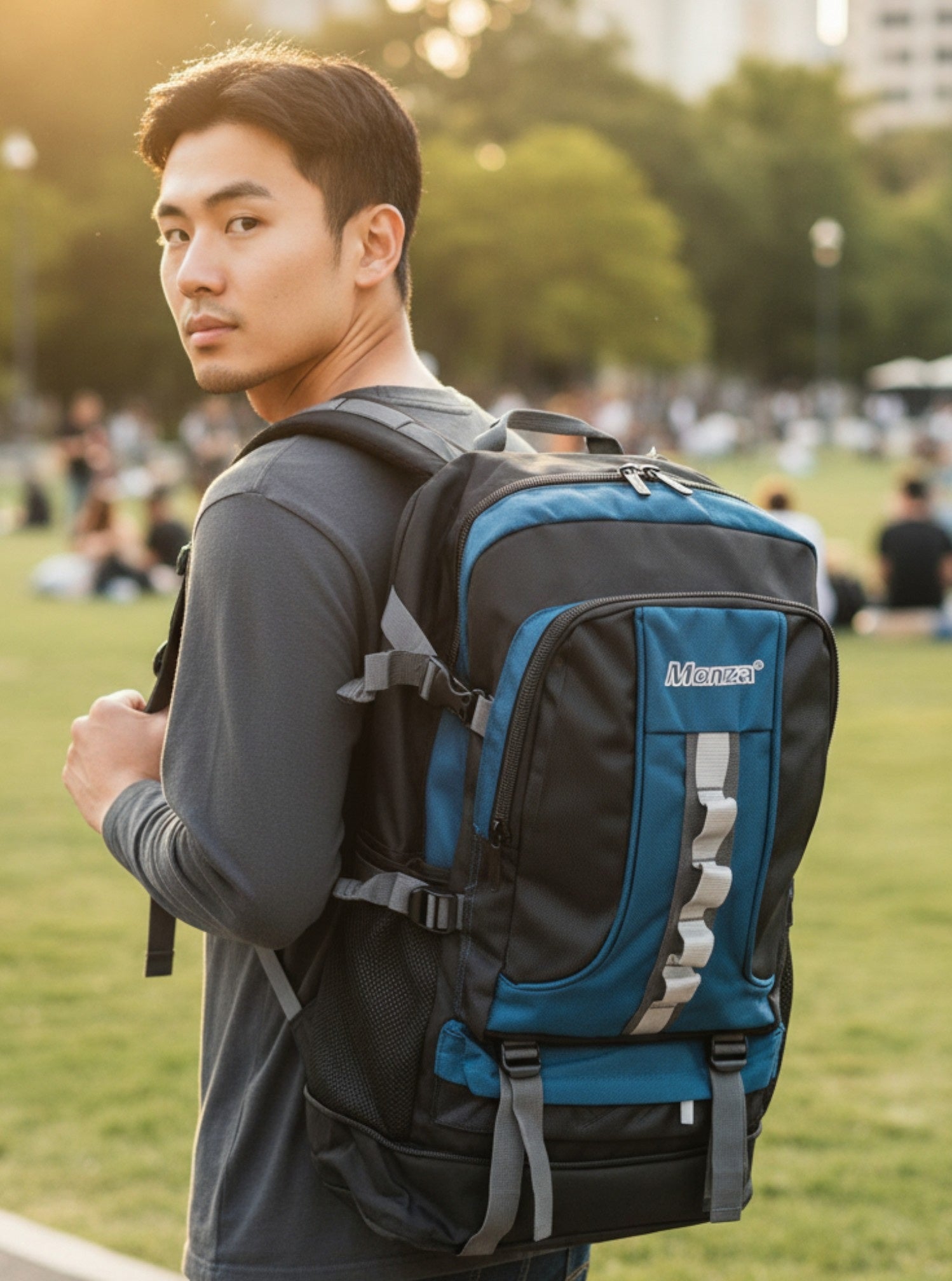 Man wearing a blue and black backpack in an outdoor setting. Monza Italy, Monza Outlet, Monza Fashion, Shein Outlet