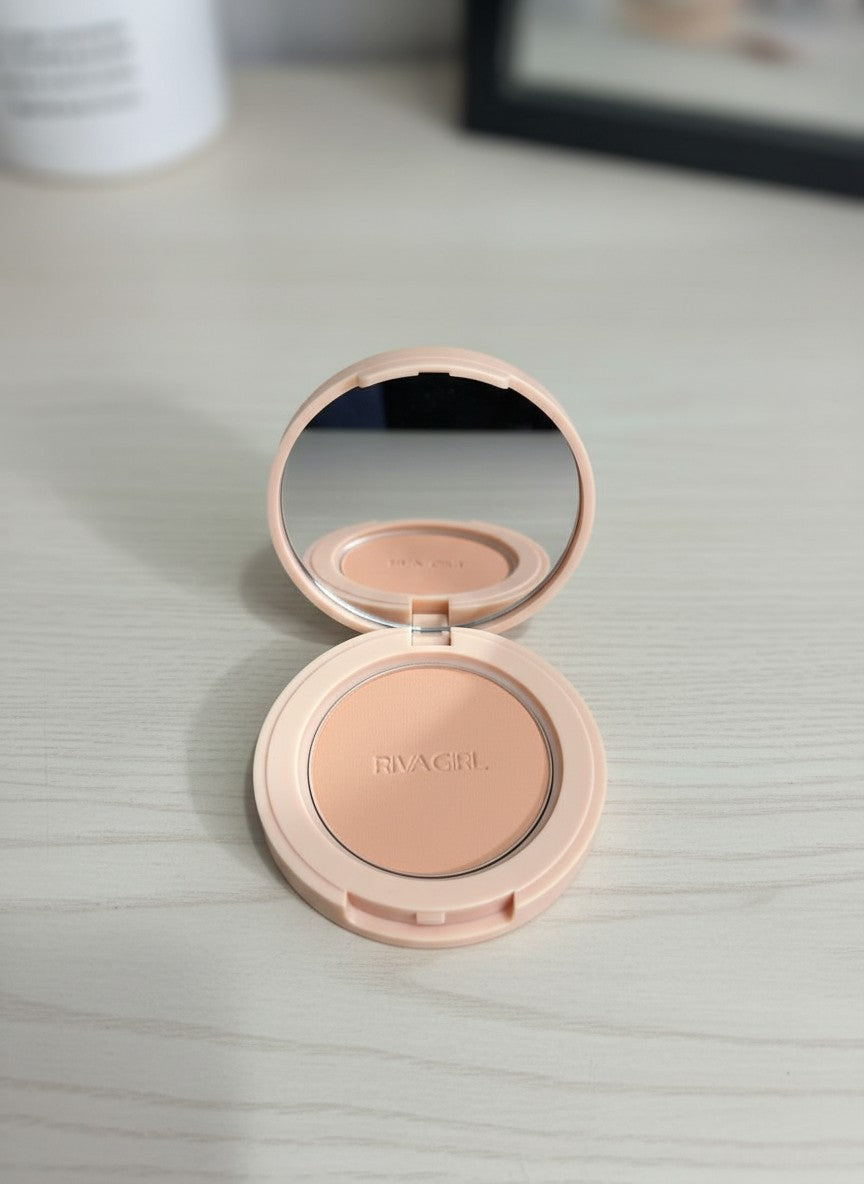 Compact powder with mirror on a light surface. Riva Girl, Monza Outlet, Monza Fashion, Shein Outlet