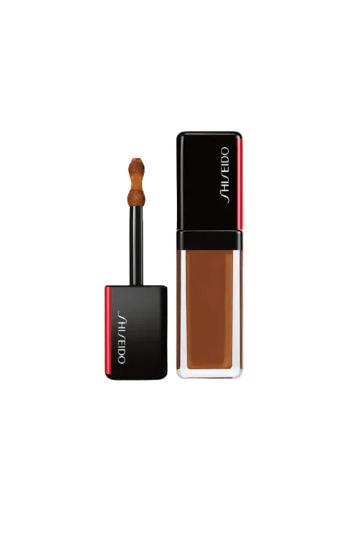 Shiseido makeup product with applicator on a white background Monza Outlet