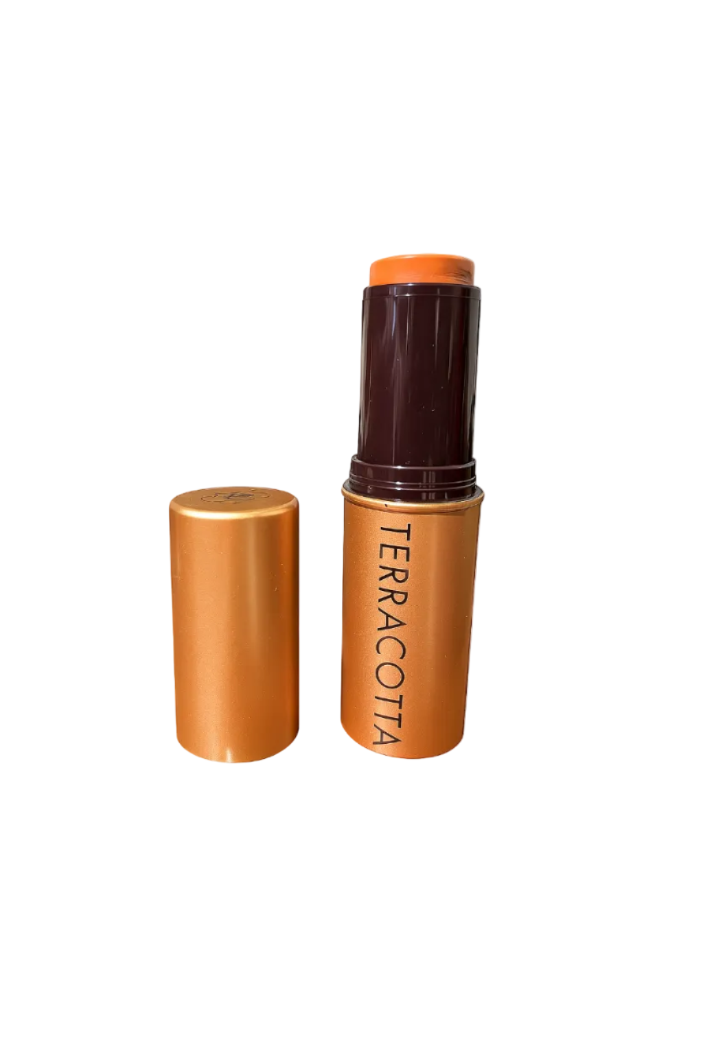 Terracotta-colored makeup stick with open cap on a white background Guerlain Monza Outlet, Monza Fashion, Shein Outlet