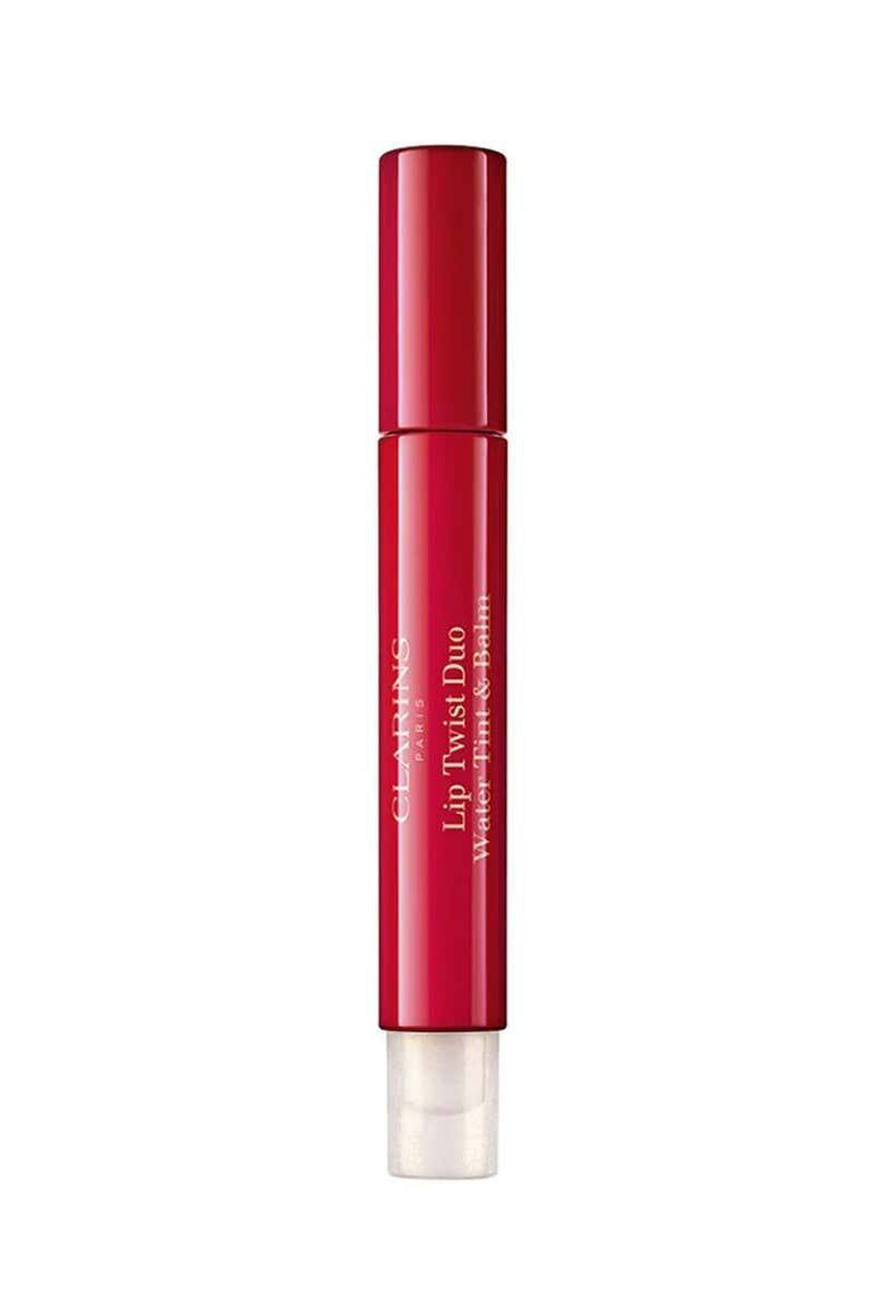 Red lip balm with white cap on a white background Clarins Monza Outlet