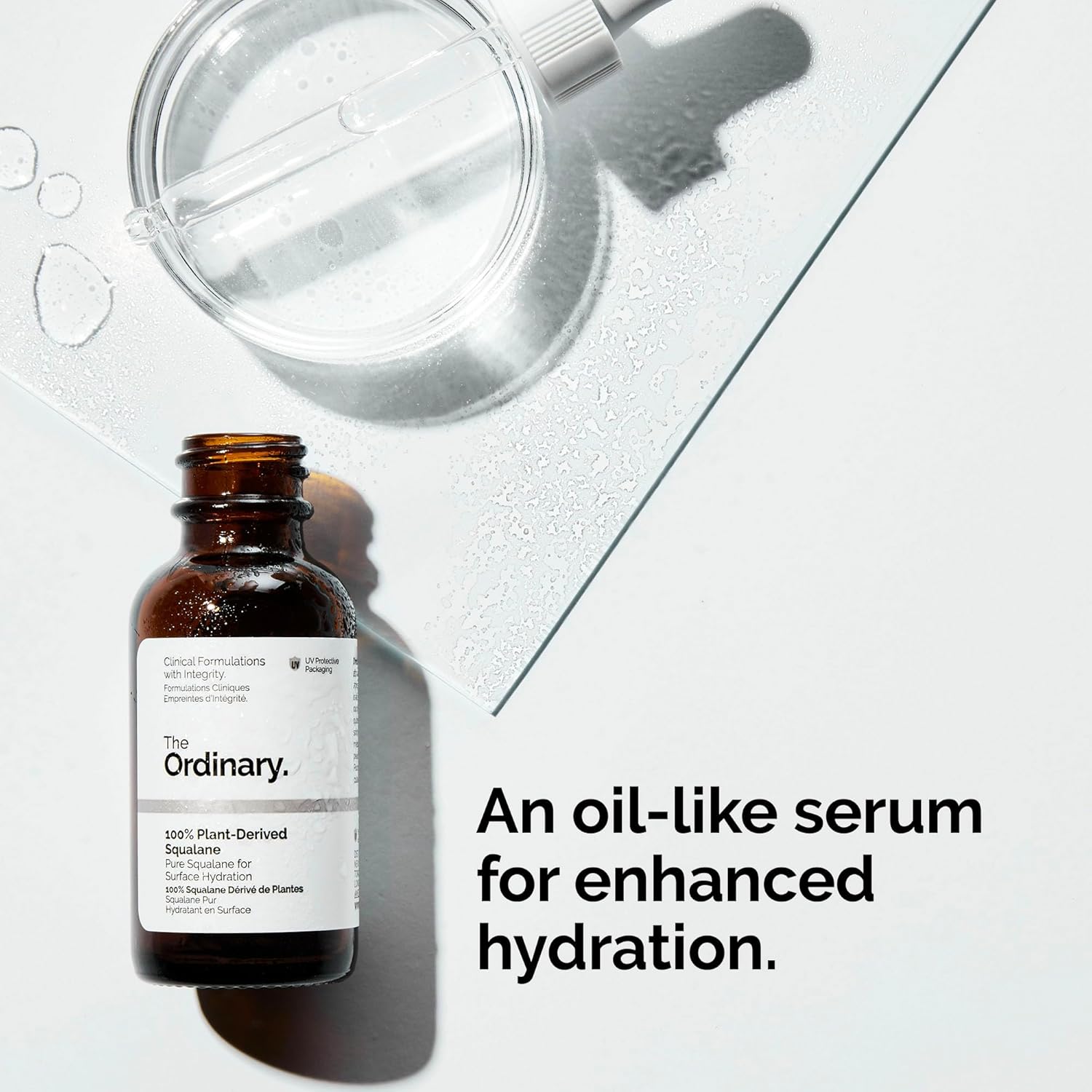 The Ordinary oil-like serum bottle on a light gray background with text. Monza Outlet