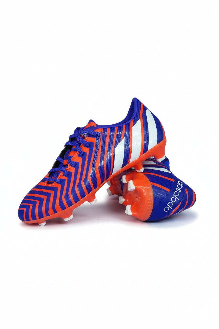 Pair of Adidas soccer cleats with blue and orange design on a white background. Adidas, Monza Outlet, Monza Fashion, Shein Outlet