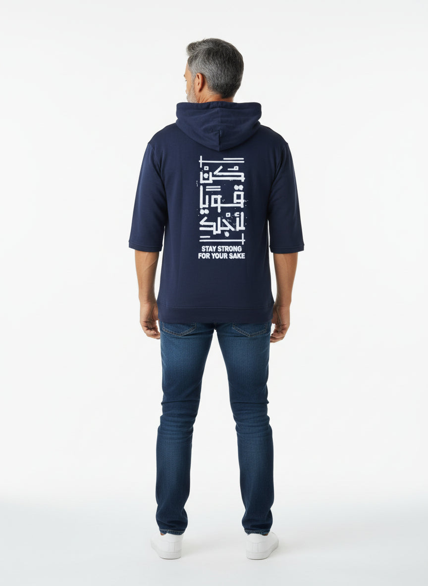 Man wearing a navy hoodie with white text on the back, standing against a white background. Antler, Monza Outlet, Monza Fashion, Shein Outlet