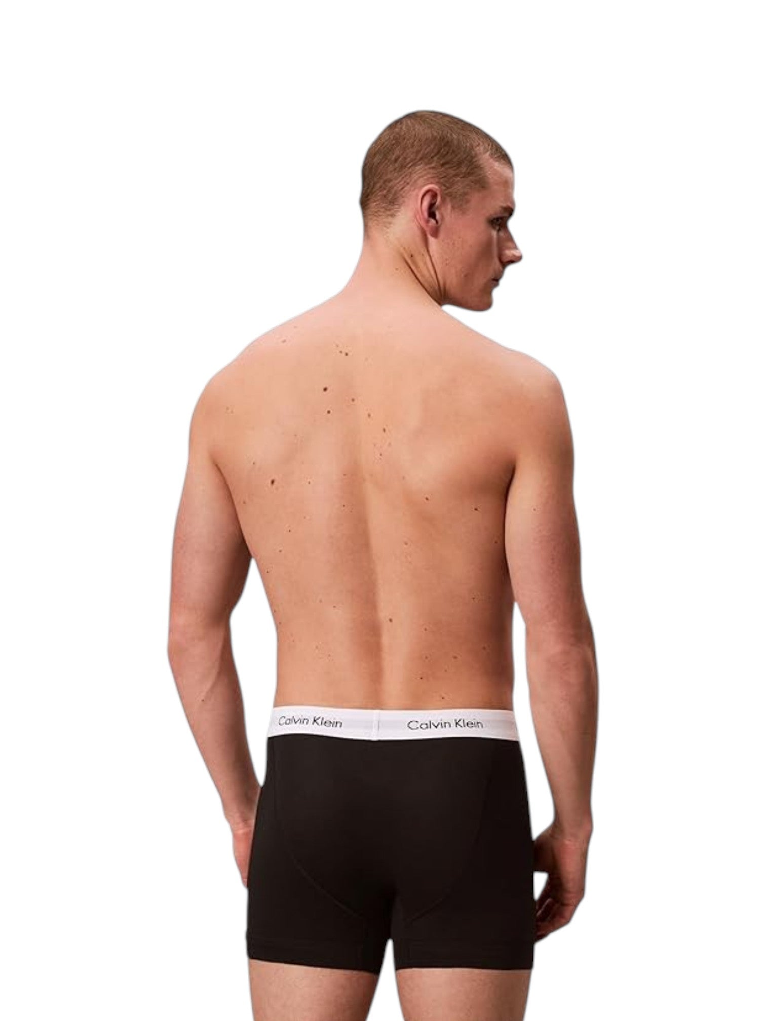 Man wearing black Calvin Klein boxer briefs on a white background. Calvin Klein, Monza Outlet, Monza Fashion, Shein Outlet