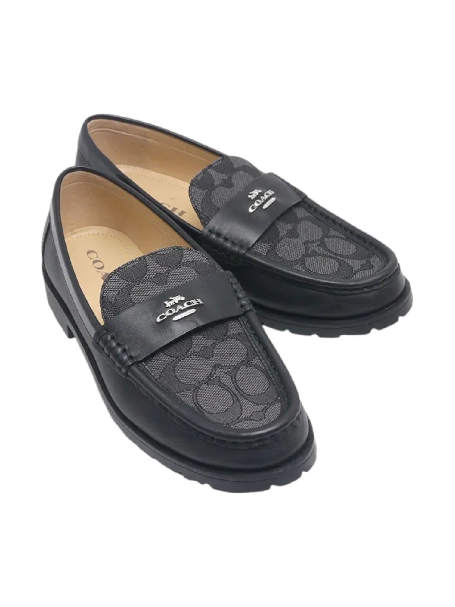 Black loafers with a patterned design on a white background. Coach, Monza Outlet, Monza Fashion, Shein Outlet