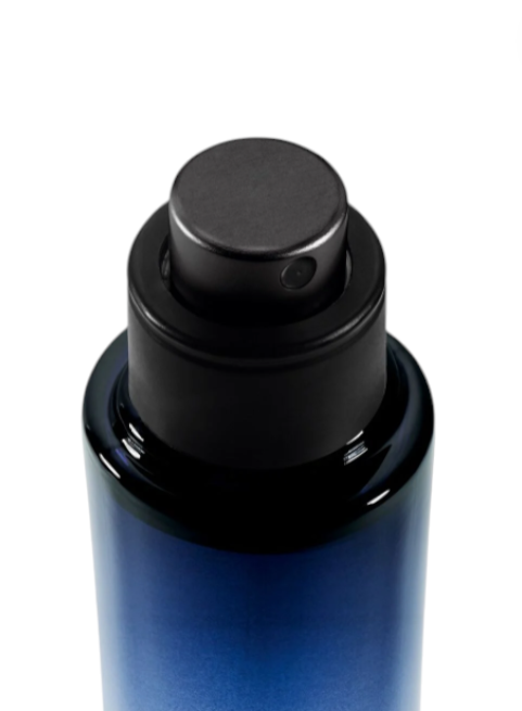 Blue bottle with black cap on a white background Monza Outlet