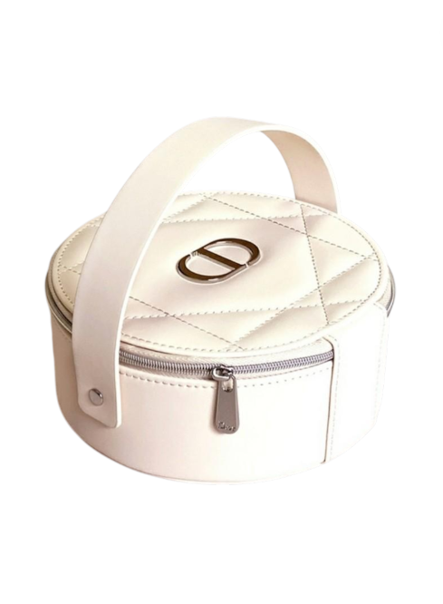White quilted handbag with a handle on a white background. Dior Monza Outlet