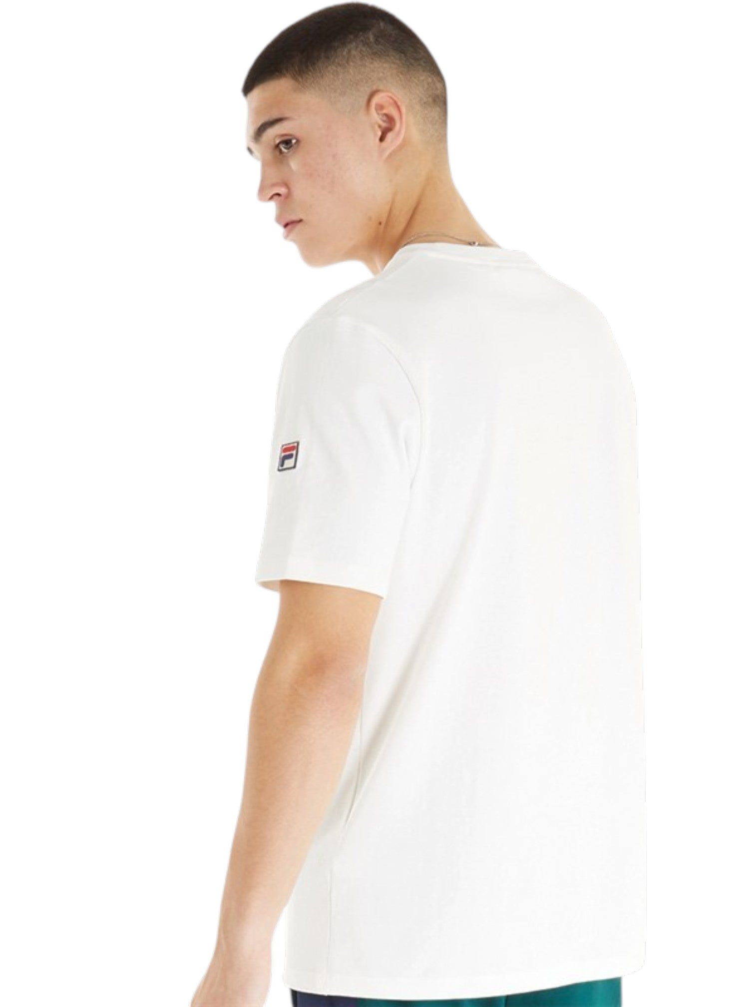Person wearing a white t-shirt with a logo on the sleeve against a white background. Fila, Monza Outlet, Monza Fashion, Shein Outlet