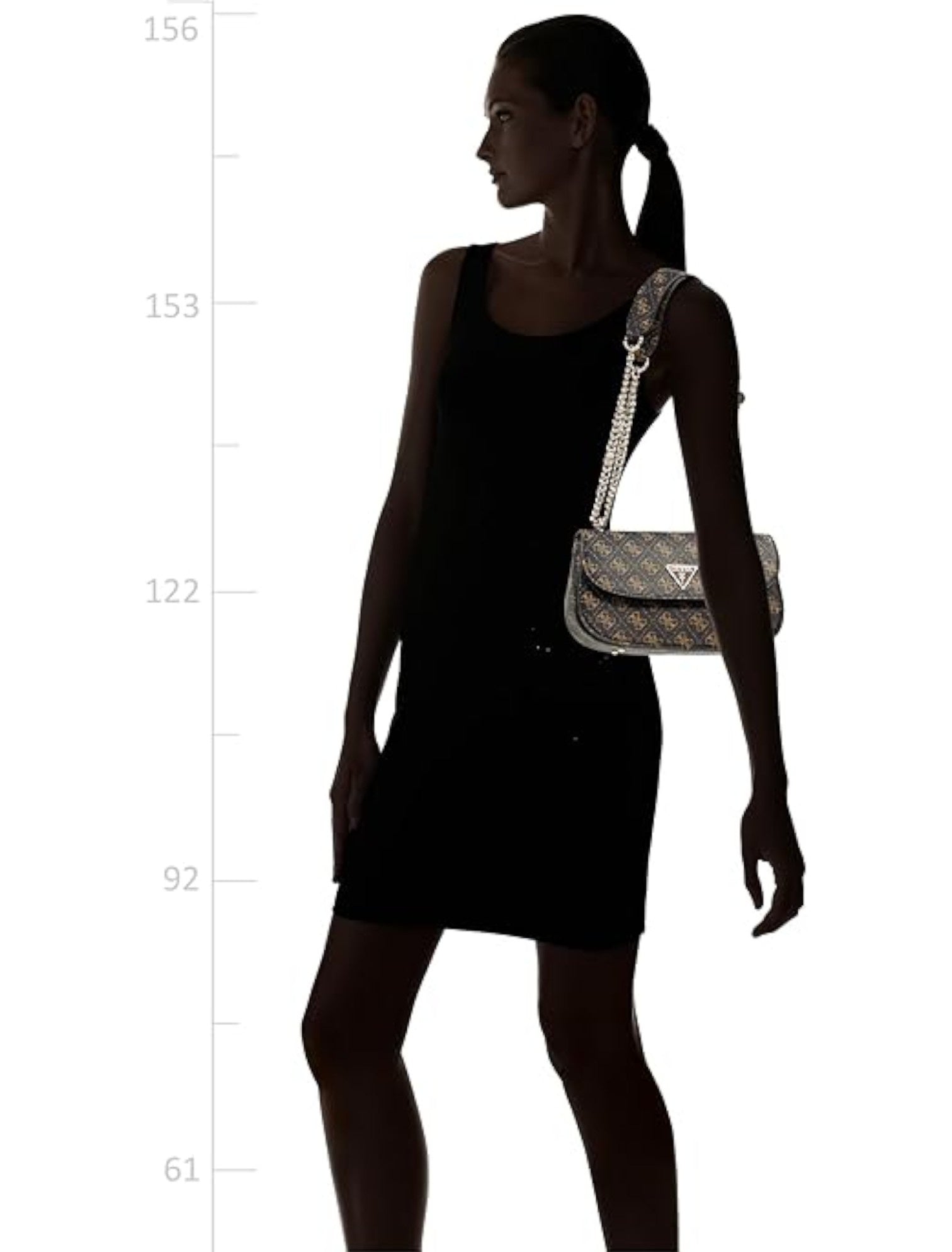 Silhouette of a person wearing a black dress and carrying a silver handbag on a white background with measurement scale. Guess, Monza Outlet, Monza Fashion, Shein Outlet