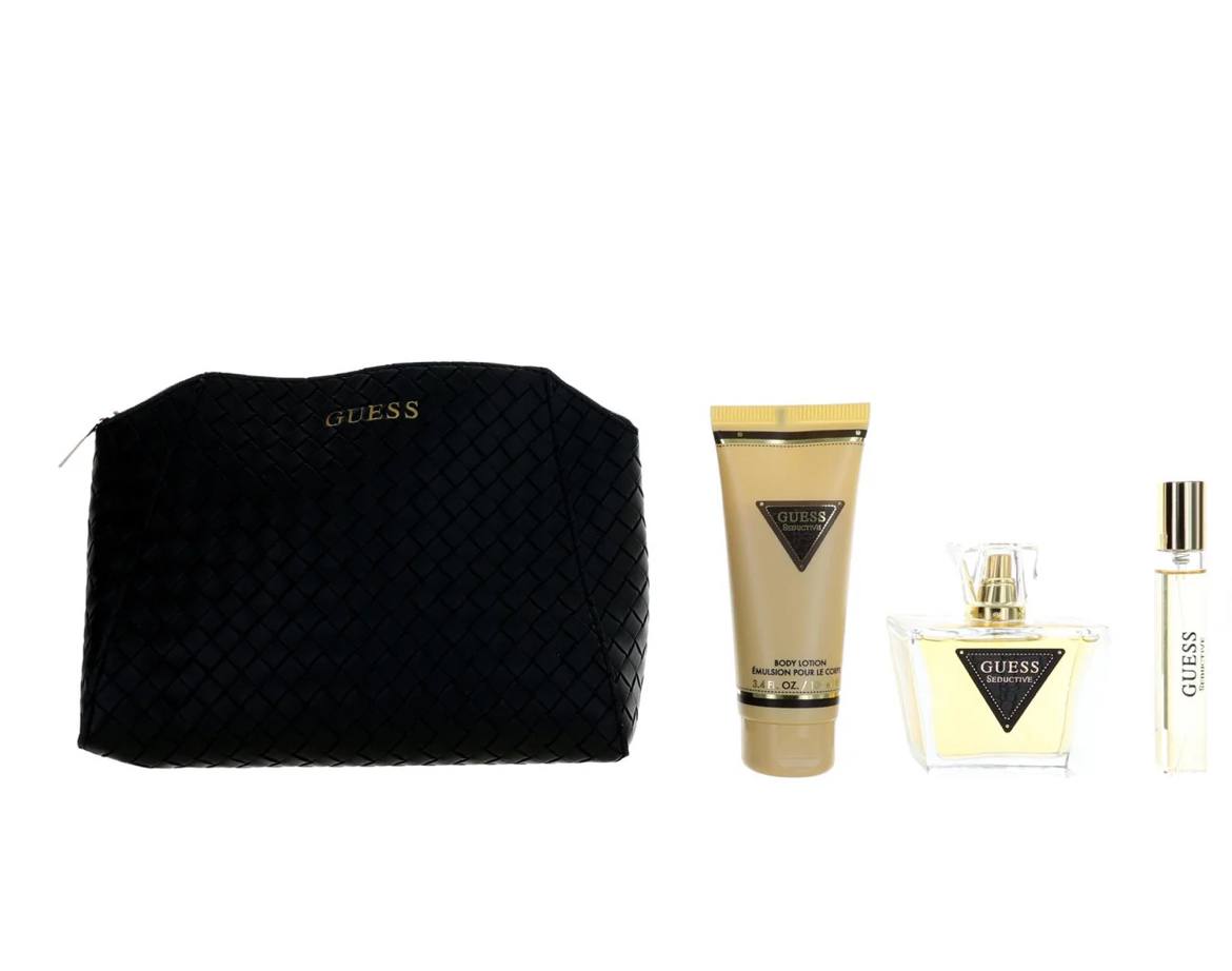 Guess perfume set with a box, bag, and bottles on a white background Guess Monza Outlet