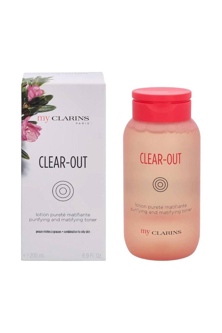 Clarins 'Clear-Out' toner bottle and packaging on a white background monza outlet, Shein outlet, monza fashion