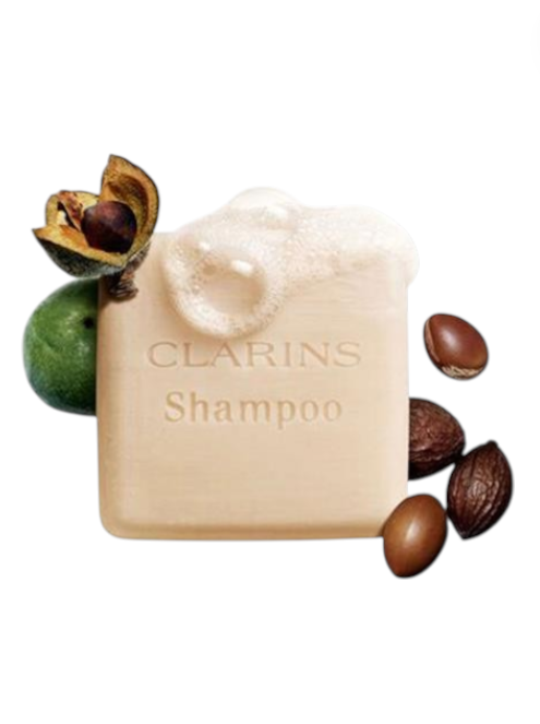 Clarins shampoo bar with botanical elements on a white background monza outlet, Shein outlet, monza fashion