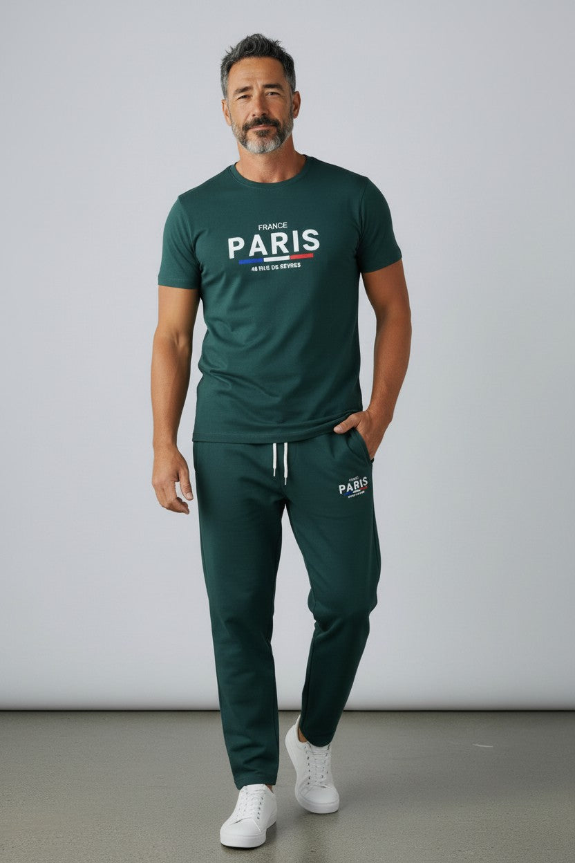 Man wearing a green Paris t-shirt and pants against a plain background. Antler, Monza Outlet, Monza Fashion, Shein Outlet